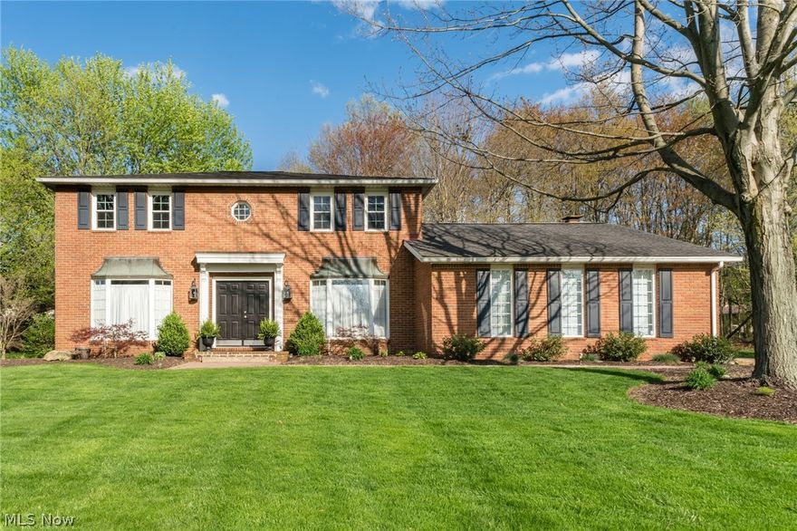 Gorgeous brick colonial with a list of updates. Stunning kitchen with corian countertops, family room with fireplace, living room, formal dining room, a beautiful tiled sunroom plus a private backyard. Partially finished lower level is perfect for entertaining. Absolutely stunning home with a gorgeous " French country appeal" Motivated seller!