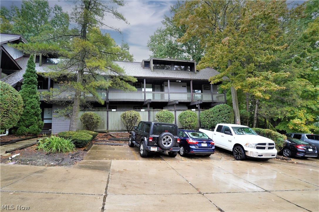The ultimate in carefree living! Welcome to this two bedroom, one and half bath townhome. Built for comfort with so many updates including new carpet, modern lighting, and freshly painted throughout. The living room has a wood burning fireplace with door and large window to the deck which overlooks the beautiful, wooded area. Bright, white, kitchen has new counters, open to the living room and dining room area. There is a half bath on the first floor which has a new countertop. Upstairs you will find two large bedrooms, and a full bathroom that has new shower doors, and a new countertop. There is a detached one car garage. Cuyahoga Falls area which is close to parks, highway and shopping.
