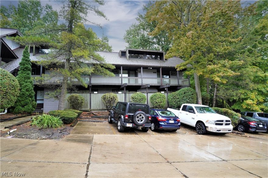 The ultimate in carefree living! Welcome to this two bedroom, one and half bath townhome. Built for comfort with so many updates including new carpet, modern lighting, and freshly painted throughout. The living room has a wood burning fireplace with door and large window to the deck which overlooks the beautiful, wooded area. Bright, white, kitchen has new counters, open to the living room and dining room area. There is a half bath on the first floor which has a new countertop.  Upstairs you will find two large bedrooms, and a full bathroom that has new shower doors, and a new countertop. There is a detached one car garage. Cuyahoga Falls area which is close to parks, highway and shopping.
