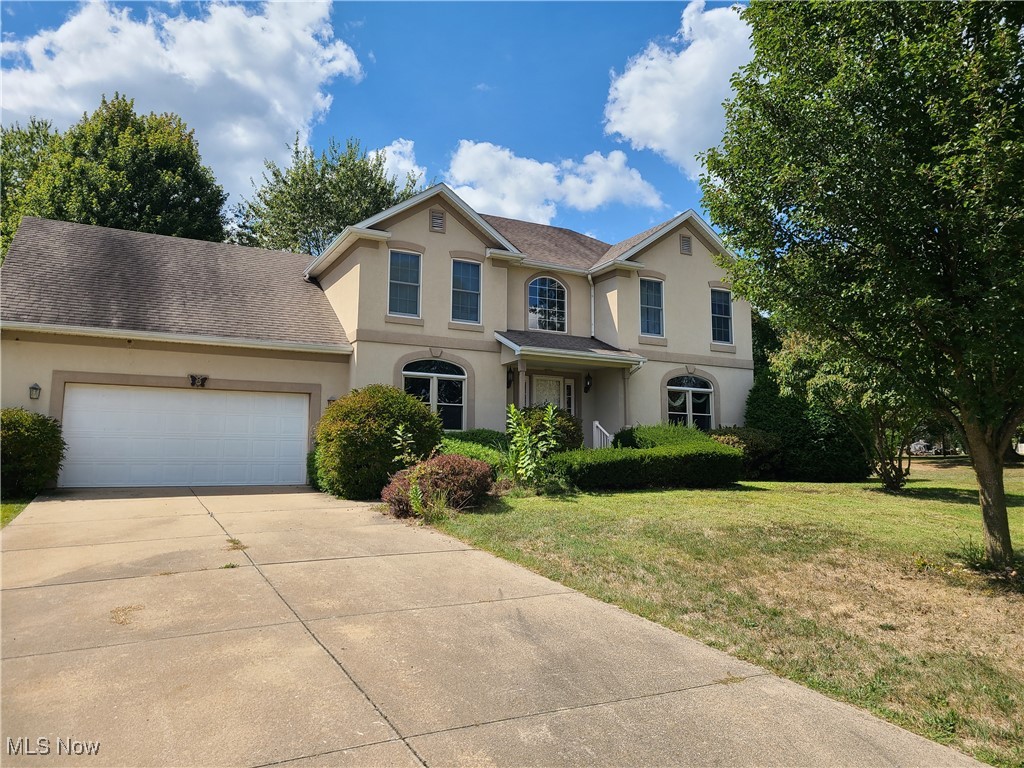 Spacious 2 story home features 4 bedrooms, 2 full baths, 2 half baths, 1st floor laundry, formal dining room, eating area, living room with fireplace. Basement is mostly finished, just needs flooring. 2 car attached garage, cement drive, rear deck, central vacuum and central air.