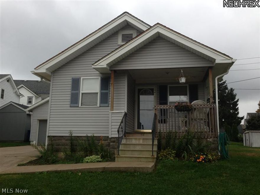 Nice two bedroom one bath house with covered front porch.  Concrete patio in back yard that is 10 x 26 offers great area to entertain.  Full basement offers plenty of storage. One car attached garage.