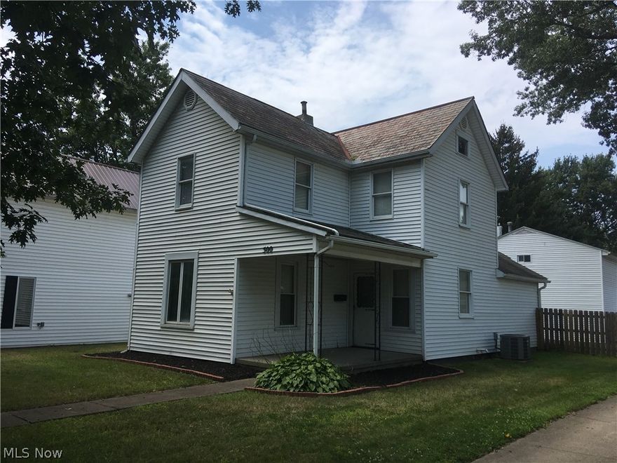 Nice 3 bedroom and 2 full bath house with a two stall two story garage. First floor laundry, first floor bedroom, with modern style kitchen. Well maintained and move in ready. Great central location between Dover and New Philadelphia.