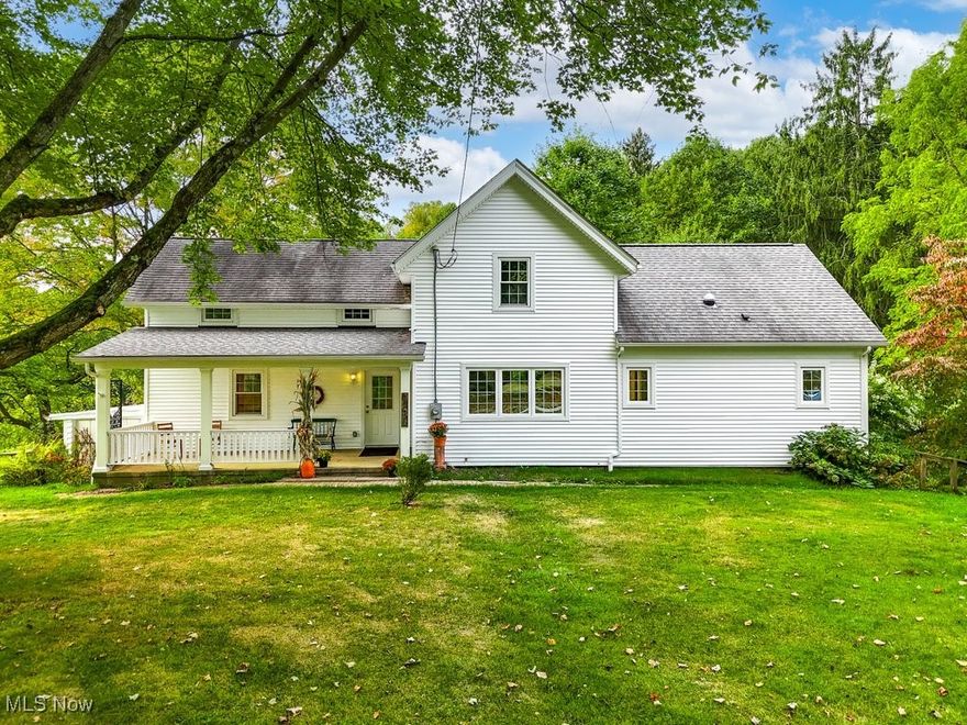 Your private retreat awaits! Welcome to this beautifully updated century farmhouse, nestled on 9.113 acres of serene countryside. This special property is the perfect blend of historic charm & modern high efficiency comforts, featuring lush perennial gardens, peaceful spring-fed stocked pond & majestic deciduous trees. Inside, the eat-in kitchen is equipped with double wall ovens, pantry, farmhouse sink & center island. The open floor plan flows seamlessly into the living room area, with bonus space that can be transformed into a formal dining room, library or anything your imagination envisions. First floor also includes a private laundry room and an owners bedroom featuring a walk-in closet with direct access to a full bathroom. Upstairs, you'll find three additional bedrooms & full bathroom, providing ample space for family & guests. Step outside onto the rear screened-in porch to savor the sights & sounds of the changing seasons, or welcome guests on the inviting front covered porch. Basement offers access to a two-car garage, greenhouse & a workbench with storage space. An impressive 24x48 outbuilding with a 10x48 lean-to provides versatile space for equipment, animals & hobbies! This special home was thoughtfully & mindfully updated with geothermal energy (as well as gas service), energy efficient windows & insulation and updates to electric, flooring, plumbing & light tubes for natural light! This home is a perfect retreat, offering both beauty & modern amenities in a peaceful, rural setting. Come experience all the charm & special features of this one-of-a-kind property!