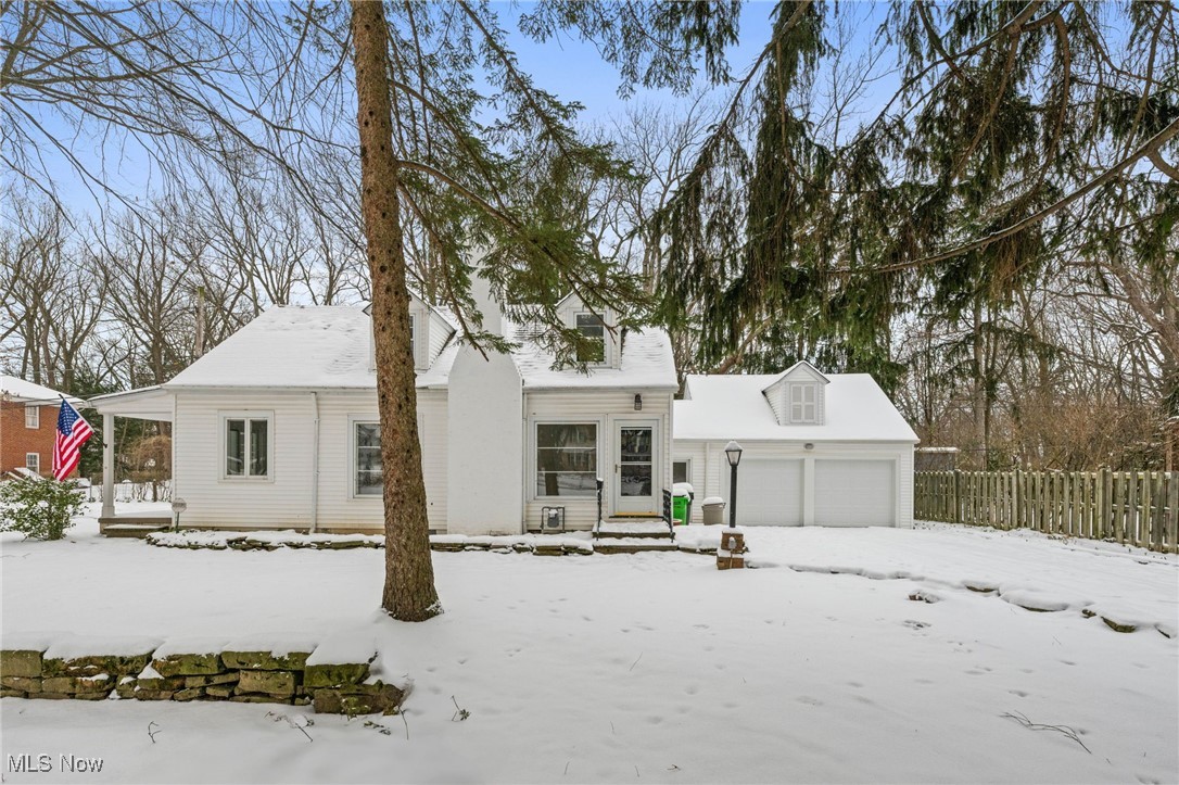 Welcome to this beautifully remodeled 3-bedroom, 2-bathroom home in South Euclid. The entire house has been updated with thoughtful design and attention to detail. The kitchen is a standout with brand new cabinets, modern hardware, sleek quartz countertops, and top-of-the-line appliances. New luxury vinyl plank (LVP) flooring has been installed throughout the main floor, adding both beauty and durability. Both full bathrooms have been fully remodeled, featuring stunning LVP tile flooring, tiled showers, and new sinks and vanities. For added convenience, first-floor laundry hookups have been added to the home. Additionally, a brand-new hot water tank, fresh paint, and updated fixtures, lighting, outlets, switches, and hardware make this home feel brand new. Enjoy the side stone patio off the house, perfect for relaxing, although it may be covered in snow during winter. The home also features new garage doors. Included in the sale is an extra lot to the South that adds more than a quarter-acre of space, extending from the backyard to the ravine. The lot provides plenty of room for outdoor activities and would be ideal for pets. The neighborhood is peaceful and the neighbors are incredibly friendly and helpful. This location is close to everything you need, from shopping and dining to parks and schools. Schedule your private showing today.