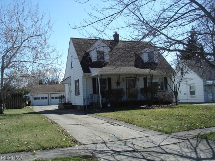 Sharp 3 bedroom 2 story cape home features central hall plan.  2 1/2 baths, aluminum siding.  Well maintained.  Large living room with coved ceiling and hardwood floors.  Formal dining room with hardwood.  Updated kitchen. Partially finished basement with full bath, central air, 2 car garage, shed and nice front porch.
