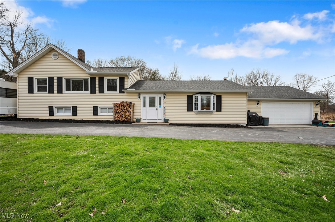 Welcome to this beautifully updated and incredibly well-maintained 3 bed, 3 bath home set on nearly an acre. This spacious property offers the perfect balance of peaceful country living and everyday convenience, just a stone's throw from Route 90, close to wineries, shopping, and restaurants.
Inside, the main level features a stunning 21' living/family room centered around a cozy wood-burning fireplace. The custom eat-in kitchen, updated in 2020, showcases granite countertops, quality appliances, and solid craftsmanship throughout. Also in 2020, the original Bruce hardwood floors were refinished, and major updates were completed including insulated windows, solid-core doors, two gas forced-air furnaces, a sump pump, new gutters and downspouts, and an asphalt U-shaped driveway.
Just steps from the kitchen, the lower level offers a spacious 7'x26' hallway, a bedroom, full bath, laundry room, and a utility room with ample storage, ideal for guests or extended family. Upstairs, a separate entrance from the driveway opens up endless possibilities for multi-generational living, an in-law suite, or private office space. This upper level includes a 19' all-purpose room, one bedroom with a full bath nearby, and an ensuite bedroom with a walk-in closet.
Outside, unwind in the impressive 40' enclosed 3-season room or step out onto the new deck overlooking the peaceful backyard, perfect for entertaining or enjoying quiet evenings. The oversized 2+ car garage includes a convenient man door, making it easy to come and go in any weather.
This home truly has it all, space, updates, location, and versatility. If you're looking for comfort, privacy, and a move-in ready property with character and quality throughout, this is the one you've been waiting for!
