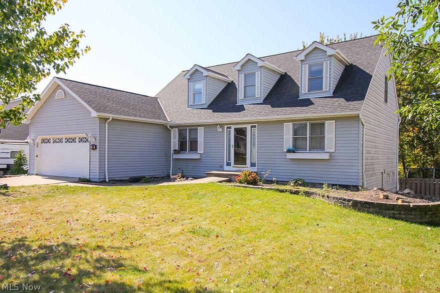 Amazing Custom Cape Cod With Desirable Open Floor Plan! Dramatic Two Story Foyer and Stunning Vaulted Great Room With Maple Hardwood Floors and Fireplace. Kitchen With White Cabinets and Bayed Breakfast Area. First Floor Master Suite With Private Bath. Totally Finished Walk-Out Basement With Full Bath, Office, Rec Room With Fireplace!! Basement Walks Out To Patio. Huge Deck Off the Great Room Overlooks the Back Yard. This Home Needs TLC Which Is Reflected In the Price. So Hurry To Grab This Bargain!!