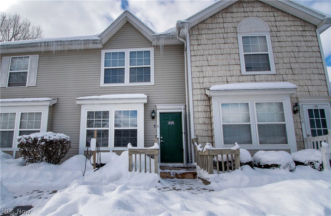 Charming maintain free condo in Woodland Trail! A 2 bedrooms, one bath, modern colors, and a partially finished basement. Open concept with living area, dining area, and kitchen on the first floor. Beautiful, high-quality vinyl plank flooring throughout the main level. The eat-in kitchen offers a tile backsplash, appliances, a dining area with sliders to access a concrete patio with privacy fencing, which is excellent for summer fun! Upstairs has a recently updated bathroom with beautiful vanity and flooring, a convenient linen closet, and two bedrooms (one with a walk-in closet 3 x 9). The basement has a Recreation room and utility room with a sink and a working toilet — A detached one-car garage. Close to all shopping, dining, and highways. Schedule an appointment today!!