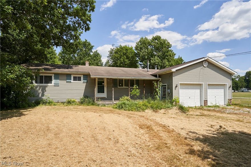 Great ranch on half of the acre lot: newer roof, siding, and windows. HUGE garage, well-sized rooms, finished basement with high ceilings. Hardwood floors around the house. New well pump and water pressure tank. Excellent location!