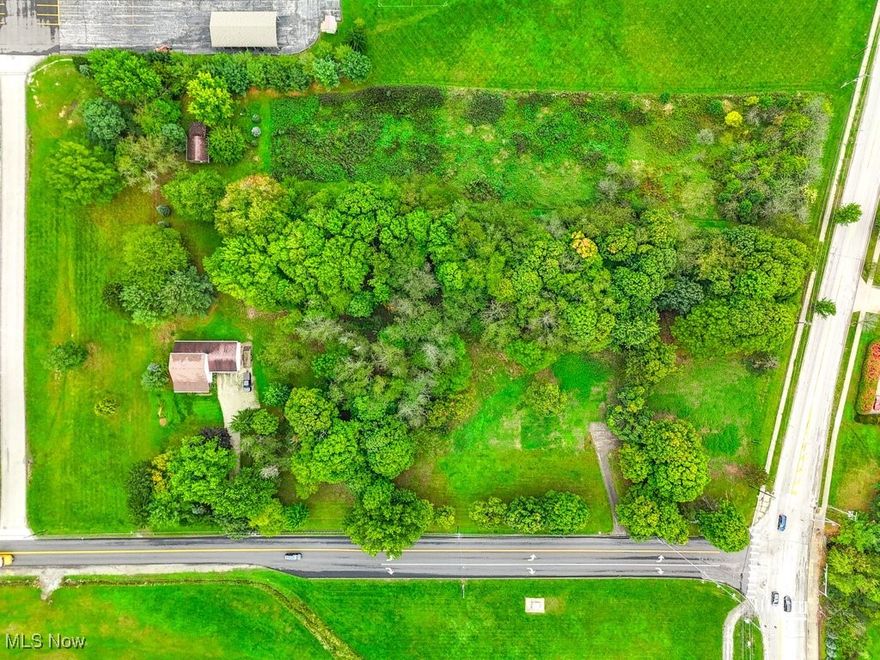 Ready to build your vision on 1.35 acres? This expansive lot offers the perfect canvas for your dream home or development project. With its generous size and prime location in the Kent City School district, the possibilities are endless. Let your imagination run wild and create a space that truly reflects your unique style and needs. Zoned as Medium Density Residential (R-2).