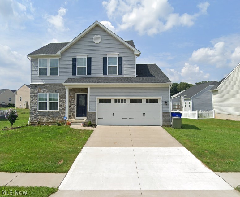 Gorgeous rental located close to Kent state University, NEOMED & easy access to highways located at 4710 Gooseberry Knoll Ravenna Ohio 44266 Beautiful Cranberry Creek in Brimfield Township in Ravenna School District. Former owners say this is a very friendly community & literally named all the neighbors, how wonderful & helpful they were! Even block parties with food trucks & scheduled fireworks show! Don't miss out on this rare find rental home with Open Concept 1st floor that includes the stunning kitchen with plenty of dark cabinetry & granite countertops for ease of preparing meals & entertaining! Includes stainless steel appliances, LVT flooring & opens to both the large dining area surrounded by windows and accessible directly to the patio for grilling & fun as well as open to the great room with abundance of seating options that includes the gas fireplace feature! Also, a half bath serving the 1st floor as well as a complete laundry room with washer & dryer with direct access to