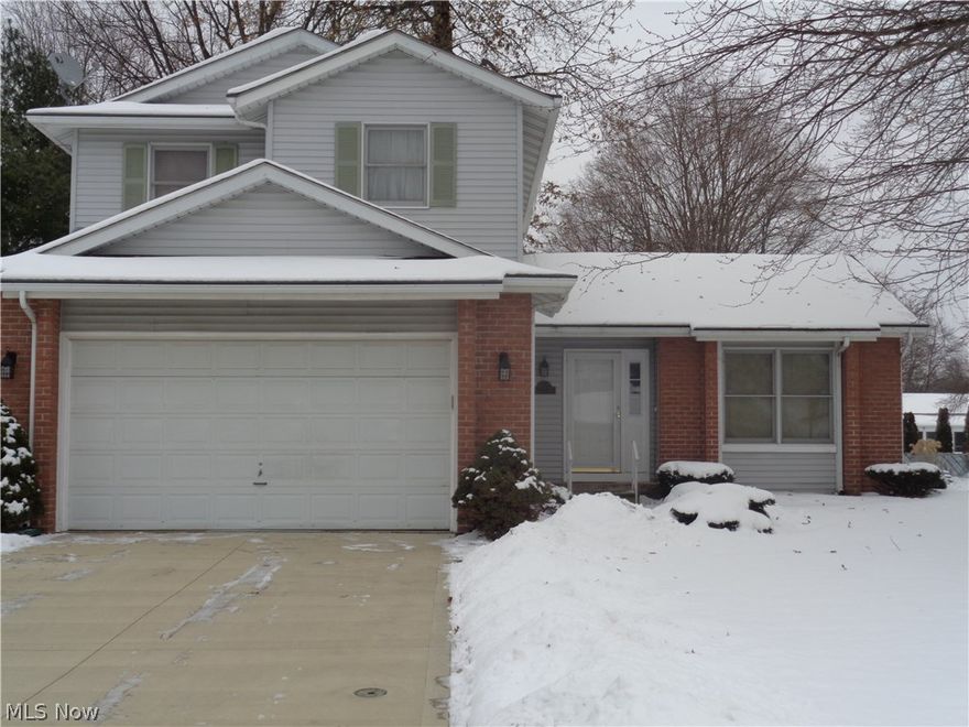 Located in the Amherst School District, with a Lorain City Address, is this well maintained 3 Bedroom, 2.1 Baths, Colonial Home in Orchard Hills Sub Division. Oh my!! Wait till you see the updates to this beauty. Cuddle up corner fireplace in the Family Room to relax and enjoyed with family and friends. Formal Dining Room that will seat a bunch, The kitchen provides a cozy space for morning breakfast, quick bites and midnight snacks. All appliances in the kitchen are staying including the washer and dryer in the utility room.  You want more? How about laminated flooring and nice clean carpeting. The entrance way to the L shape Living Room is big enough to meet and greet family and friends with warmth.  New Counter Tops all Bathrooms. All walls have been freshly painted. 3 Bedrooms up with the Master Suite providing a private bath, powder room, closet and decent size master bedroom with newer carpet. Loads of windows. Gas Heat. C/air. And the back yard is fenced-in with your private fen