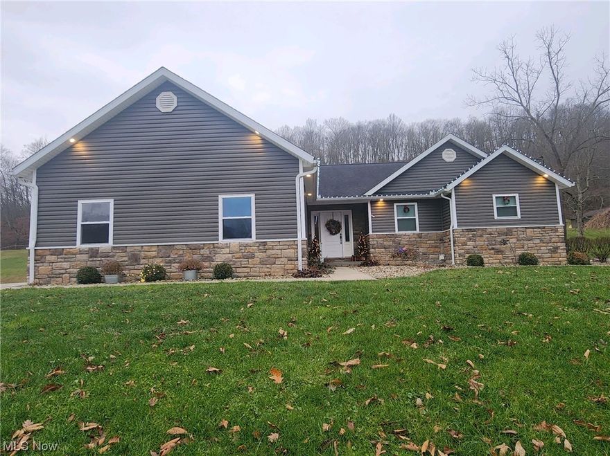 Welcome to your dream home! This stunning residence, built in 2015, boasts a perfect blend of modern luxury and comfortable living. Nestled in the heart of Noble Local School District, this 3-bedroom, 2-full bath haven offers a spacious and inviting open floor plan that will delight both residents and guests.As you enter, you'll be greeted by a grand, high-ceilinged living area seamlessly connected to a chef's dream kitchen. The massive kitchen features high end appliances and abundant counter space, complemented by a generous pantry for all your storage needs. The large laundry room adds to the home's practicality making daily chores a breeze.The master bedroom is a true retreat, with ample space, a walk-in closet, and an ensuite master bath that exudes luxury. Inside the master bath, you'll find not only a walk-in shower and an indulgent jacuzzi tub but also the convenience of another closet for additional storage.  His and her sinks in the master bath further enhance the space, adding a touch of sophistication to this oasis of relaxation.Two additional spacious bedrooms, each with its own sizable closet, provide comfort and privacy for family members or guests. For added convenience, a second full bath is nestled between the two bedrooms, ensuring easy access for all.The home also features a full walk-out basement, with plumbing already in place for an additional bathroom. This provides an opportunity to expand the living space or create a guest suite, adding even more value to this already incredible property.The open layout extends to the outdoors, where sliding glass doors from the kitchen lead to a patio, creating a seamless transition for outdoor dining or entertainment.You will appreciate the two-car attached garage, complete with tubing for heat – just waiting to be hooked up for the ultimate comfort in colder months. The property spans a generous 4.2 acres, providing ample space for outdoor activities and relaxation. This is a must see!!!