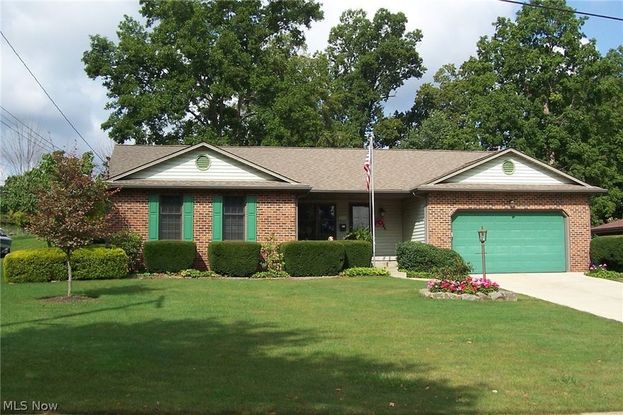 METICULOUS ONE OWNER CUSTOM BUILT RANCH on magnificent lot in great neighborhood!  Attractive floor plan with charming front porch, doors leading to four season room, deck and extra deep private backyard.  Many recent updates including new roof, furnace, hot water tank and glass block windows 2015, windows 2016, driveway and front porch 2014.   Kitchen updated in 2015 with beautiful corian counter tops, cabinets, backsplash and under cabinet lighting.  All appliances including newer refrigerator (5 years) and washer & dryer stay!  Gorgeous laminate floors in 2017.  The four season room (heated and air conditioned) is sunny and bright!  Landscaping is immaculate all around and the eye catching stone fireplace located at the back of the extra deep property is a unique, historical feature - from the original barn at the Walker Mill Sugar Maple Farm!  This home will not last long...