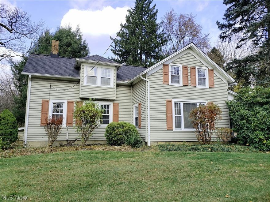 You’ll take a step back in time when entering this Solon Century Home.  Nestled on 1.6 acres abutting the Metro Park you will not believe how spacious it is.  When you enter the home you will find original hard wood floors throughout, including a Yankee floor in the dining room.  The first floor is flooded by natural light from the wall of windows in the family room addition and kitchen skylight.  The kitchen cabinets are not original to the home but taken from a historic Shaker Heights home.  A library is on the first floor for those remote learning/working or simply enjoying a good book and a hot cup of cocoa. A spacious living room and recently updated bath/laundry room completes the first floor.  The second floor includes a bathroom with a dormered ceiling and plenty of storage, a large  master bedroom with a wall of closets and two smaller bedrooms.  Stepping out into the backyard is like entering your own sense of peace and calm and is ready for exploring and making those lasting