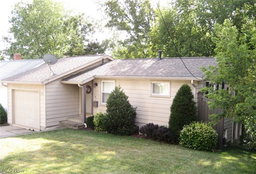 Unique property in great condition that is cute as a doll house. Nothing left to do, everything has been done. Finished basement with remodeled kitchen, dining area & bathroom. Many other updates over the past several years include: replacement windows, doors, hot water tank, shingles, spouting, oak trim, paint, floor coverings. Fantastic enclosed rear porch (24x10) and deck overlooking wooded hillside. Take a look and see if this home can fit your needs.