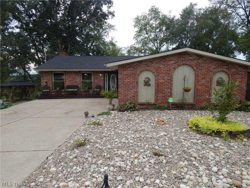 Basement was gutted and completely redone.  Updates include: new electric entrance, wet bar, roof, generator, furnace, Bamboo flooring, small pond, gazebo, new septic motor and drain line, french drains and sump pump all this since 2015.   Also includes a storage building, whole house fan, newer windows  and covered patio.   Pond is full of fish.
This home  is well cared for, a Must see.