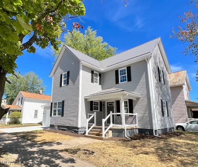 Check out this totally remodeled 2 story home that is within walking distance to all the local downtown activities! This home has 3 bedrooms, 2 1/2 baths, a first-floor laundry room and a brand new 2 car attached garage. Everything is brand new! There is a new metal roof, vinyl siding, new insulation, and new windows. Inside is a new custom kitchen, all new baths, new drywall, a new gas furnace with central air, a new hot water tank, new electrical and plumbing, all new flooring and fixtures. It is located on an easy to maintain corner lot. Great neutral colors throughout. Immediate possession is available.
