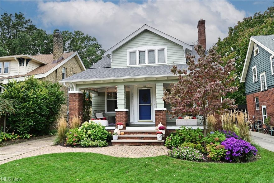 Lovely Cape with Craftsman details! Great porch/flower boxes/swing! Vestibule with original tile floor/paned windows! Spacious living room with light, hardwood floors/walk-in closet/gas-burning fireplace/intricate wood mantel/tile surround flanked by glass-doored bookcases! French doors to dining room/modern light fixture! Beautiful woodwork/solid wood doors! Large kitchen with hickory cabinetry/black hardware/SS appliances/double sink/room for small table/chairs/granite and butcher block countertops/pretty glass subway tile backsplash/newer hardwood flooring/greenhouse window! New light fixtures/ceiling fans! FFR bedroom with windows to rear! Tons of architectural detail! Newer paint throughout/fun color block design details! Nice first floor bath with original pedestal sink/deep tub/penny tile flooring/built-in linen cabinet! Cool carpeted stairs to a large hall with unique/curved railing! Second bedroom with wood floors, closet and laundry chute! Over-sized master bedroom with curved ceilings/built-in/lots of windows/two closets! Second full bath beautifully redone with x-large walk-in shower/white subway tile/mosaic marble flooring/white cabinetry/fixtures/vented glass-block window! LL is partially finished with glass block/projector TV/recessed lights! Utility area with double sink/newer washer and dryer/workbench/plenty of storage! Home rewired! Newer roof/exterior paint! Excellent curb appeal with newer landscaping/sod! Rear yard with cedar planters/patio! Newer A/C!