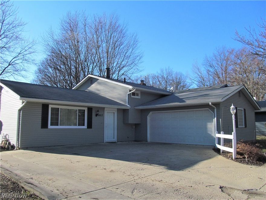 Be first or be sorry! Nicely updated three bedroom, two bath Split Level. Eat in kitchen with pantry, ceramic back splash and porcelain tile flooring. Formal dining room with a Pella slider leading to a big covered patio. Nice living room. Big family room with a full wall brick fireplace, a bonus room, wet bar, mud room, laundry room and a full bath. Nice owner suite with a tandem full bath. Two car side load attached garage. Loads of storage in the garage. Extra wide driveway with turnaround. Fenced yard! Hot water tank replaced 2018. Living room picture window, carpet & paint updated 2017. Turn around drive 2013. Siding, gutters & downspouts replaced 2011. Shed 2009. Close to Interstate 480, shopping, restaurants and schools. Includes 1 Year HMS Home Warranty!