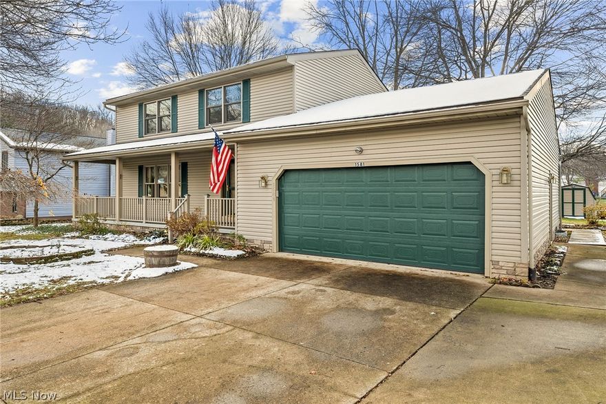 Not to be missed! Wonderful custom-built 4BD/3.5BA colonial, nestled on a quiet street between 2 cul de sacs in the beautiful Rivermoor Estates neighborhood of Suffield Township. The main level is comprised of a formal entry, living room, dining room w/tray ceiling, half bath, and large eat-in kitchen recently updated with newer vinyl flooring and Cambria quartz countertops, and pantry was converted to a convenient 1st-floor laundry. A cozy family room leads off the kitchen and features another 1st-floor full bath and access to the 2-car garage. From the kitchen is a center-hinge door that opens to a nicely sized deck overlooking the peaceful and private backyard. Upstairs are 3 generous bedrooms and a full bath, plus the master bedroom suite with attached full bath. A full large unfinished 12-course basement provides abundant storage, a 2nd laundry area, and could be finished for additional living space. Many updates have been made w/in the past 10 years including the roof, air condit