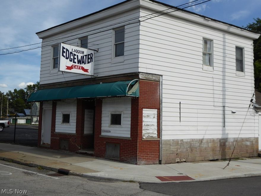 The iconic Edgewater Cafe.  Extremely visible bar with a D-3 license just off the West 49th Shoreway exit.  Fast growing area with renovations, new construction homes and apartment buildings all around.  Sale includes the building, business, liquor license, one bedroom apartment (with downtown views), courtyard  and a masonry 2-car garage.  Keep the old school feel or bring in your new concept and watch the neighborhood grow around you.  Easy access from downtown, Ohio City, Gordon Square, Tremont and Edgewater Park.  Two blocks from the Cleveland Lakefront Bikeway.   Two blocks from the Shoreway and just blocks from I-90.  Don't let this opportunity pass you by!