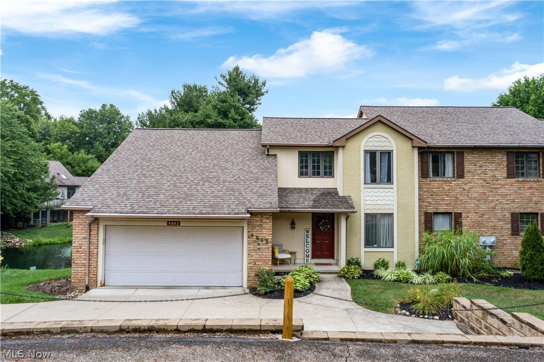This gorgeous end-unit condominium features a quiet and convenient location, abundant natural light throughout and many tasteful updates. On the first floor there is a large family room with vaulted ceilings and gas fireplace, laundry off the kitchen, and master bedroom with an updated luxury master bath and cedar lined walk-in closet. The kitchen has been updated with an abundance of cabinets and a gorgeous tile backsplash. There are two bedrooms upstairs with plenty of closet space and a jack-n-jill bathroom. Right outside the dinning room you'll be able to enjoy your morning coffee or entertain guests on the oversized deck that extends from dinning room to master bedroom and has an incredible view of the pond and fountain....few things are better than the sound of an outdoor water fountain! This development handles all the outside mowing, snowplowing and exterior maintenance. Call today to set up a private showing! This great condo will not last long.