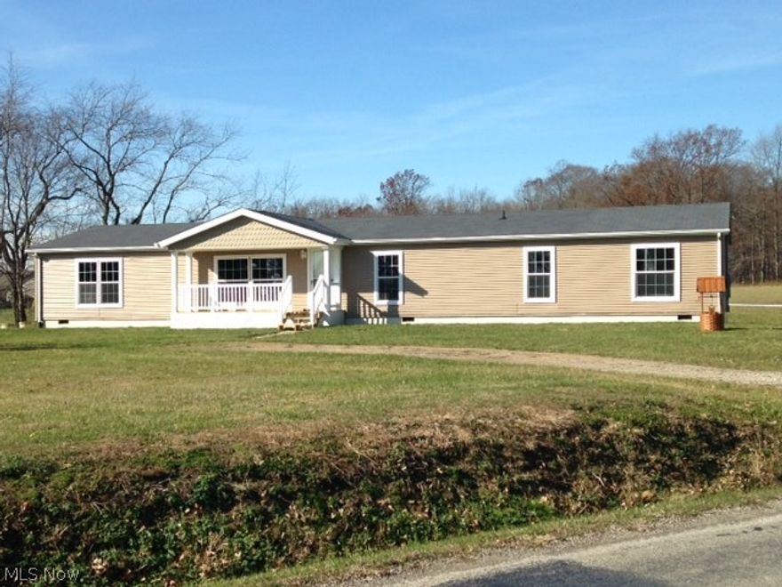 Great home for large family. New quality floor coverings throughout, new paint, water softener, new front porch, new 6 x 27 rear deck, patio doors, central air, oak trim, tilt-in thermo pane windows, vaulted ceilings, garden tub and free standing shower in large master bedroom with walk-in closet. Great place to ride ATV's. Natural gas is available.