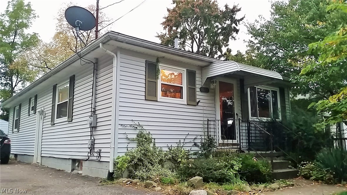 Located on a quiet dead end street - yet minutes from shopping & dining; this 3-4 bedroom, 2 full bath, ranch home offers plenty of living space & storage. Square footage does not include additional living space in basement. Owner has made multiple updates during the course of ownership. Original hardwood floors flow from living room, hallway and into 2 of 3 bedrooms. The 3rd bedroom can easily be converted to a home office/bonus room. Sliding glass doors lead to an enclosed sun room. Lower level provides 2nd full bath, large laundry room with storage, utility/storage room and bonus room (currently being used as a master bedroom) with a walk-in closet. Must see for yourself to fully appreciate what this home has to offer