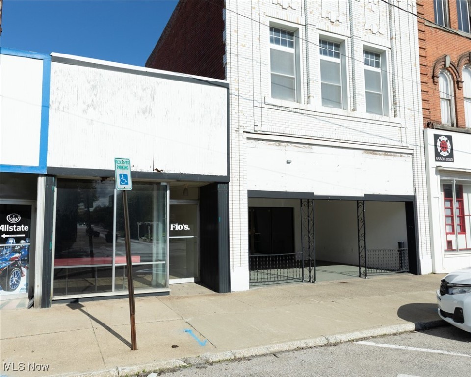 Once home to Hershey’s Ice Cream parlor, this charming mixed-use building in Downtown Ashtabula offers the opportunity for investors, restaurateurs, or entrepreneurs seeking a high-visibility location with income potential. Built in 1900 and full of character, the property has two levels of versatile space. The ground floor features a flexible layout ideal for a restaurant, café, or retail business, with an additional storefront that could be perfect for a boutique, coffee shop, or gallery. Large display windows offer prime exposure to foot and vehicle traffic on Main Avenue, making it an attractive space for business owners looking to establish a presence in Ashtabula’s growing downtown district. The second level presents the perfect opportunity for conversion into a residential rental unit or office space. With proper renovations, this upper floor could become a charming apartment or short-term rental generating steady income in a city that’s seeing increasing tourism and revitalization. Don’t miss your chance to breathe new life into this iconic Ashtabula property. Whether you’re an investor or business owner, 4601 Main Avenue holds endless potential.