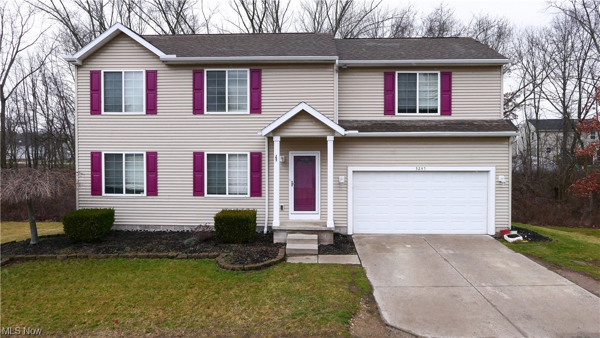 Welcome to this charming 3-bedroom, 2.5-bathroom colonial that offers a perfect blend of comfort and style. The inviting living room features a gas fireplace, perfect for relaxing evenings. The kitchen boasts newer stainless steel appliances and a tile backsplash, seamlessly flowing into the dining area. On the second floor, the master bedroom offers its own master bath and spacious walk-in closet, while two additional bedrooms share a full bathroom. Convenient second-floor laundry. The finished basement provides additional space for recreation or entertainment and includes a second laundry area. Step outside to the rear concrete patio, where you can enjoy the peaceful view of the nearby stream. Attached 2 car garage. Recent upgrades include a newer hot water tank, newer flooring on the second floor, the basement, and a freshly painted interior. 1-year home warranty is included. Don't miss the chance to make this beautiful property your new home.