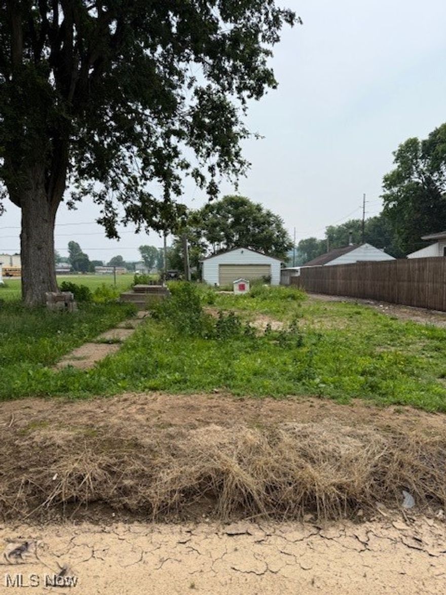 City water and sewer are on the lot with an older 2 stall garage on the property. Recently had an older Mobile home that Burnt up about 6 or so months ago. City lot 45x137. There are zonings for Mobile Homes in Newcomerstown, one being 10 years or newer and must be approve by the Village.