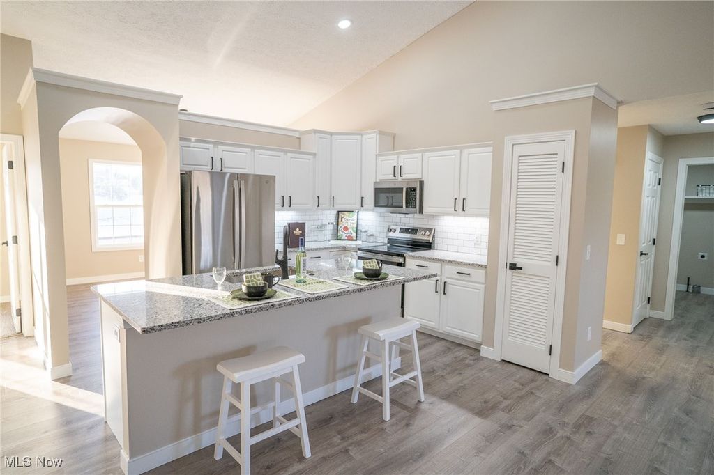 Photo of 4662 Helmsworth Drive NE, Canton, OH 44714 (MLS # 5183077)