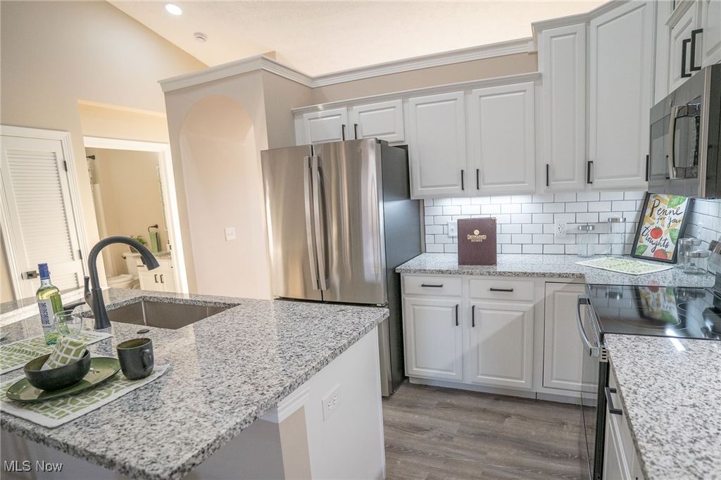 Photo of 4662 Helmsworth Drive NE, Canton, OH 44714 (MLS # 5183077)