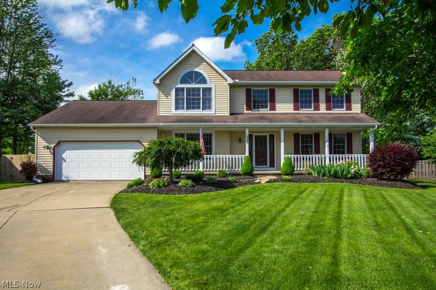 In a high demand neighborhood, located on a cul-de-sac street, is this impeccably cared for 5 bedroom 3 bath colonial with an open floor plan and stylish decor. Living room with French doors opens to family room with brick surround wood burning fire place, crown moulding and sliders to outdoor wood deck for ease of entertaining. Large eat-in kitchen has island with bar top seating, pantry, all appliances & breakfast nook with sliders to outdoors. Master suite with vaulted ceiling has walk-in closet, spa tub and walk-in shower. Second floor is complete with 3 additional nice-sized bedrooms and full bath.  Formal dining room with chair rail, crown moulding and wood floors. First floor also includes 5th bedroom, full bath and mud room. Basement features finished rec room with bar top seating, cabinets and mini fridge plus a bonus room with built-ins. Two car attached garage with pull down attic storage and water access (garage door-2014). Large fenced in backyard with shed and large wood