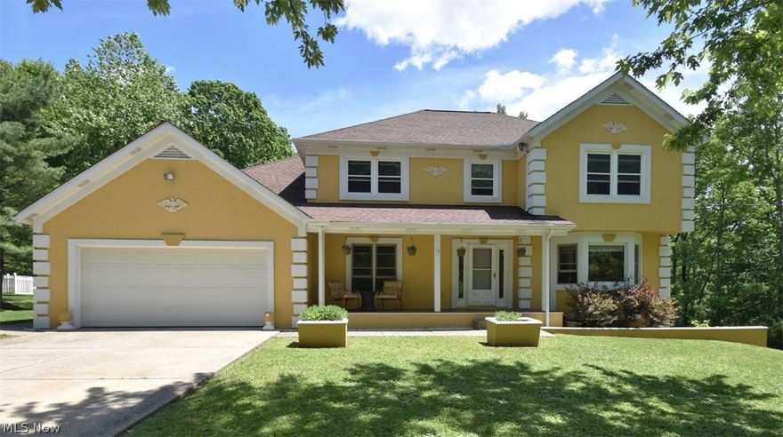 You will not want to miss out on this opportunity to see this custom built home located on almost an acre in Walton Hills. From the front porch to the back deck overlooking the gorgeous park-like backyard where you will find hiking and relaxation at its best! The basement is waiting for your personal touch, it is plumbed for a bar and walks out to an open patio that is pre-wired for a hot tub; perfect space to host those summertime BBQs. The wood on the deck and the front porch was replaced, as well as the roof all in 2020. Pride and love abounds in this one owner home. Owner was a plasterer and it will not go without notice, especially the detailing on the ceilings and throughout the home. You will find the same designs at Playhouse Square which was also created by this amazing artisan. The exterior of the home was replastered with s soft Aztec Yellow 2 years ago.  The windows on the 2nd floor are all newer 2021.  Check out the dimensions of all the rooms in the home!  You will find t