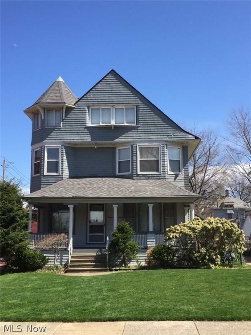 This lovely corner lot century home is a must see!  Colonial with wonderful architectural detail features 5 Bedroom, 3 full bath, 2 car garage, fenced in yard with lots of privacy and sprinkling system. Offering a formal dining room with beautiful wood/lead glass pocket doors opening up to the spacious living room and an additional quaint sitting room with fireplace. The second floors offers 4 nice sized bedrooms with Victorian style decor, built in shelving in hallway closets and a full bath. Master suite is on the third floor, cozy sitting area with a full bath. Full basement offers plenty of storage, full bath and laundry area. The huge front porch is perfect for those beautiful summer nights!  This home borders Lakewood and is minutes from downtown, walking/biking distance from the lake, beach, and other desirable lakefront attractions. This home is filled with charm and character…..don’t miss out on this one!