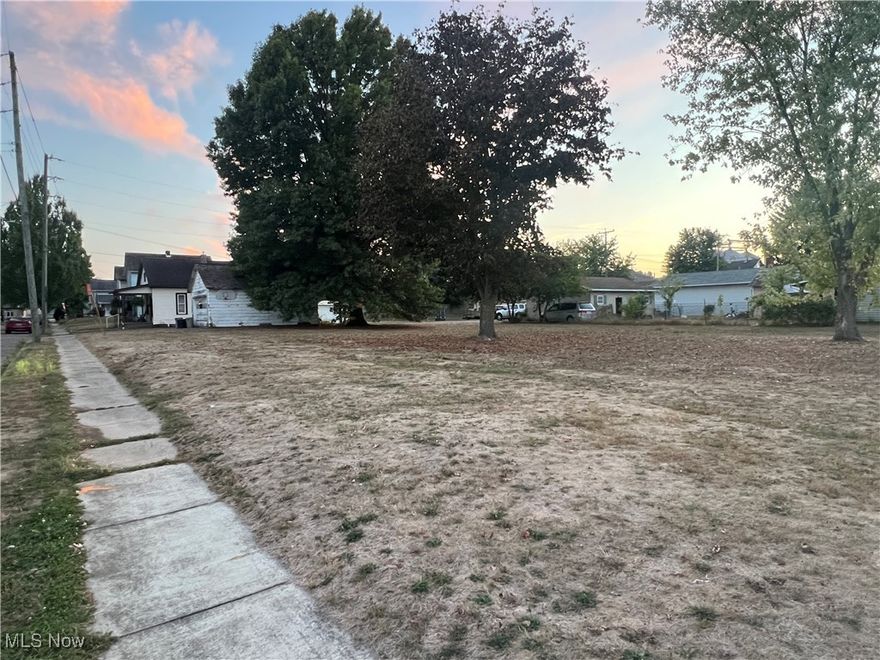 96 X 157 corner lot in a high traffic location.  City utilities available.  18 X 24 garage currently tenant occupied.  Zoned Business 2 for small business, also potential residential or multi family use.
