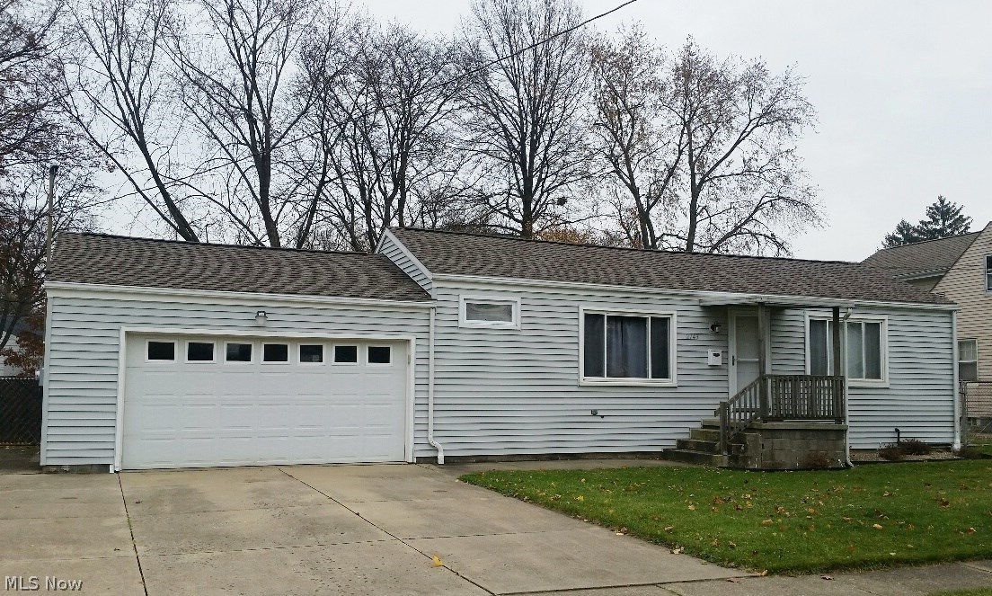 Come see this adorable & affordable 2 bedroom ranch with an open floor plan and rarely available attached 2 car garage! Located in Cuyahoga Falls on a double lot, this home has many updates including newer windows (2011), a complete roof tear off (2009), updated electric (2007) and sliders to the newer concrete patio (both in 2013 - also front storm door was new in 2013). The applianced, spacious, eat in kitchen offers plenty of cabinets & granite counters. Updated bath features a newer tub, floor and vanity. The backyard is completely fenced and a full basement allows for additional storage. Both the washer and dryer are included (purchased 2014). This home has central air plus a whole house fan for the new homeowners comfort. Home warranty for peace of mind. Make an appointment to see this property today.