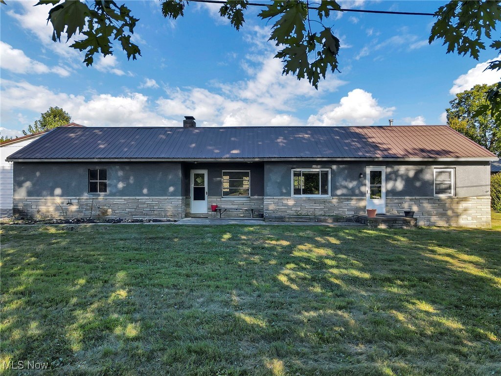 Welcome to 5636 Old Logan Rd — a home that's as practical as it is fun. This 2-bedroom, 1-bath house has been about 80% remodeled, giving you updated living spaces with the chance to finish it off in your own style. The main floor is cozy and inviting, while the basement adds extra living potential with a bonus room that could be used as an office, gaming room, workout space, or hobby area. Parking and storage won't be a problem here. You'll have a 1-car attached garage for everyday use, but the real prize is the oversized 2-car detached garage. One side is built with extra height and comes with a fully installed car lift—a dream setup for car enthusiasts, weekend mechanics, or anyone who's been looking for the ultimate workshop right at home. There's plenty of room for tools, toys, and projects of all sizes. Step outside and the property gets even better. The backyard has its very own RC dirt track, perfect for racing RC cars, hosting friends, or just enjoying something totally unique. Between the garages, the car lift, and the RC course, this place offers a lifestyle that mixes comfort, work, and play in a way you won't find every day. 5636 Old Logan Rd isn't just another listing — it's a property with personality, ready for someone who appreciates a home with both function and fun built in.