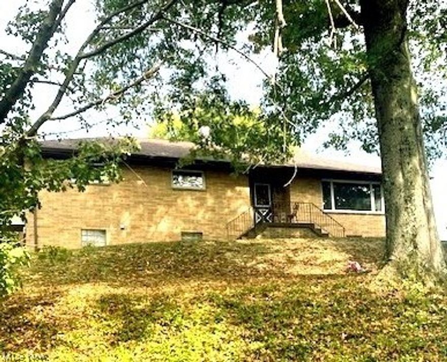 Well-Built 3 Bedroom Brick Ranch situated on approximately 1 acre lot. The spacious eat-in kitchen has been very nicely remodeled with lovely gray cabinetry 
  and laminate wood like flooring. Stainless Steel appliances consist of range, dishwasher, & microwave. There have been updates such as newer Roof 2021, 
  Gutter, soffit & facia 2020, Bathroom Cabinets, Sink & Counter top 2022, microwave 2023 and new garage door is ordered and will be installed this month. 
  There is county water and the septic was pumped 2020.  The large yard is great spot for kids to play, raise chickens, and plant a garden. The back 
  patio is a wonderful area to relax and enjoy the out of doors.