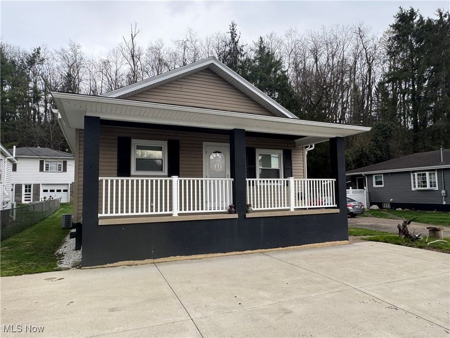 Check out your new home! Nice and cozy!  Ranch home with two bedrooms, one bath, oversized two concrete parking spots in the front of the house. Newer windows, vinyl siding, 200 Amp breaker service. Laundry in the basement, sump pump in the basement. Per the seller flood insurance is required. Currently the back yard has underground fence from the Pittsburgh Fence Company. New owner would need to purchase a receiver and collar. Per the seller concrete-off street parking cost $7000.00 and electric fence was $2200.00