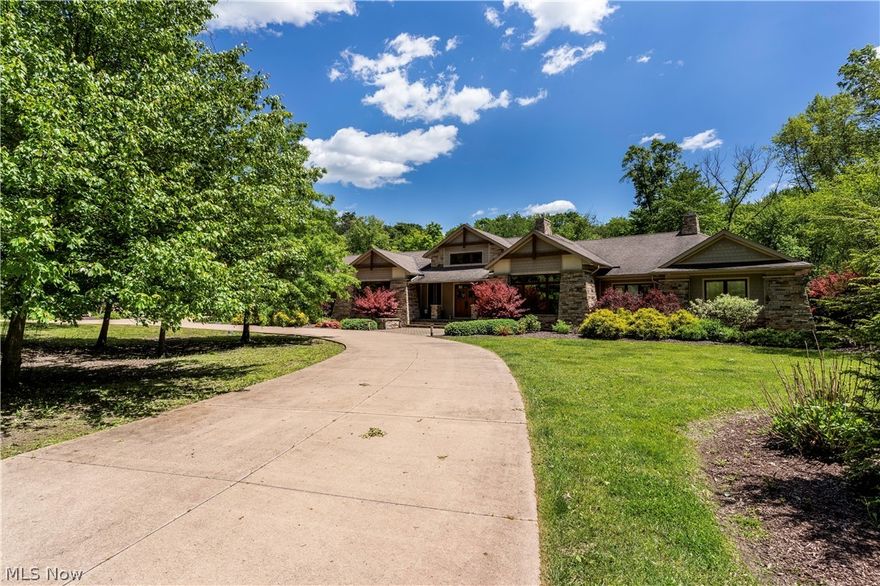 SIMPLY THE BEST!!  This architecturally designed estate is steeped in unique craftsmanship and luxury. Reminiscent of minimalist architecture made famous in the past, this masterpiece offers boundless amenities & upgrades . The 4 Bedroom 5 Bath sprawling estate includes 49 acres of natural splendor, with peaceful views of the private wood lot & stocked lake. Looking for the perfect home for your beloved car or cars? Then you will be pleasantly surprised with the 3 car heated garage and a 3 car garage carriage house. Entertaining in this spectacular home will impress your family & friends.  From the massive Great Room w/ slate flooring, stacked stone accent pillars, cathedral ceilings, and cove ceilings to views that it frames. If you love to cook, the chef designed open kitchen is ready for you to enjoy. Kitchen also features Maple floors, butcher block island w/sink, custom cabinetry, soapstone counter tops, Sub-zero refrigerator & Freezer, Wolf Range, Double ovens, Seating for 6 at c