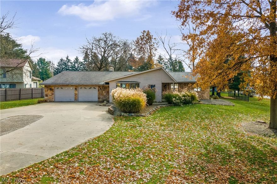 Very unique home with open floor plan.  This 3 bed 2 bath home is spacious with many possibilities.  Large family room with stone fireplace and a large great room perfect for entertaining.  Lower level is finished with possible 2 more bedrooms and a large cedar closet.  Laundry is on main level.  There are 2 covered patios, one overlooking fenced backyard with pond. The garage is a 2 car with another garage door that opens to the back yard.