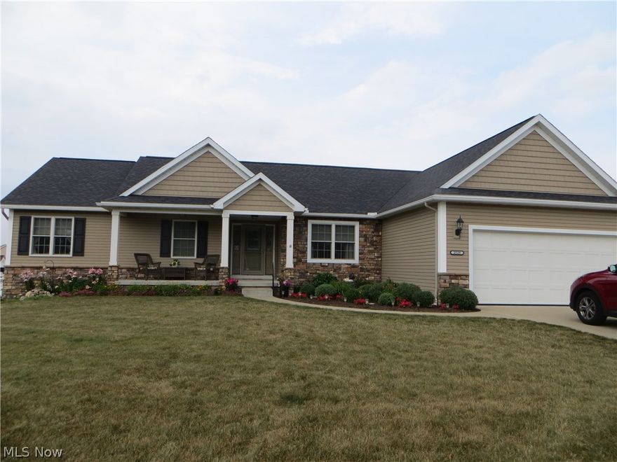 This is a must see custom home with too many options to mention. This home has an in-law apartment complete with two bedrooms, living area with a kitchen, and a full bath. If that is not needed than this could be a owner suite or teen suite or kids bedroom area with play room attached. Downstairs could also function as an entire living area with a legal bedroom and full bath, a recreation room with an extensive wet bar, a family room that walks out to a patio, a room that was set up for weight lifting, and a flex room that was originally built to be a recording studio. You have front and back covered porches to enjoy the views of the neighborhood and the lovely landscaped yard.