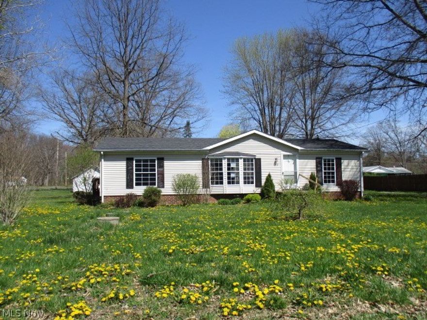 Spacious open floor plan 3 bedroom, 2 bath ranch situated on a large corner lot featuring oak kitchen plus master bedroom suite with garden tub and skylight.