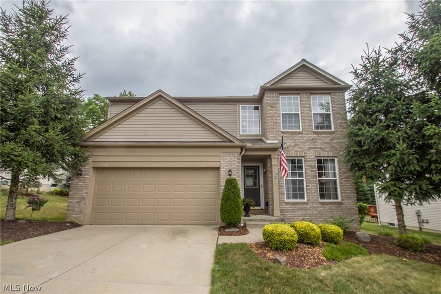 Wonderful 3 bedroom colonial nestled in Fountain Pointe! This home showcases a nice open living area & patio with a private wooded view! This great Colonial style, Pulte built home features 3 bedrooms, 2 full & 1/2 baths! Open floor plan with plenty of natural lighting!  Cozy 2 story living room w/ fireplace opens to the bright eat-in kitchen w/ dining area, center island, and ample cabinet & counter space. Convenient 1st floor laundry and office/living room. Staircase leads to the spacious master bedroom w/ walk-in closet & en-suite bath. 2 more generously sized bedrooms & 2nd full bath complete the second floor. Freshly painted throughout.   Quiet street w/ no-thru traffic, community stocked pond & located just minutes from the Metro Parks, highway access & shopping!  This house has been well maintained.  Call me today for a private showing!