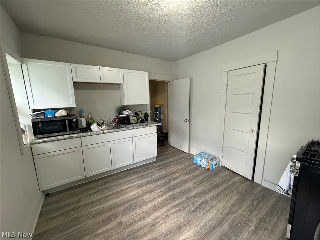 Photo of 9418 Dickens Avenue, Cleveland, OH 44104 (MLS # 5217498)