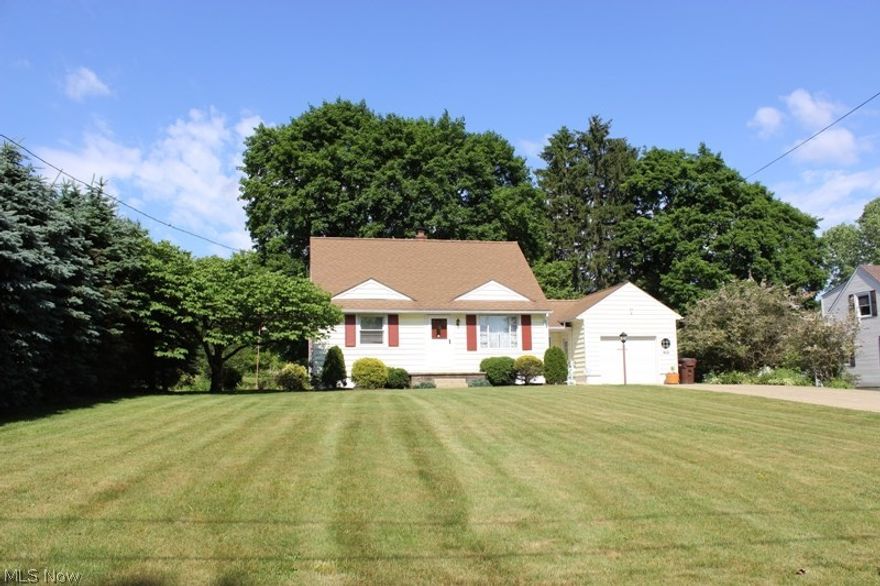 This charming Bungalow home has been well-loved for many years by it's long-term owners, and now is awaiting it's new residents to enjoy. Ideal setting that offers a wonderful deep yard, perfect for backyard Recreation and Gardening. It offers two first-floor Bedrooms, with original hardwood flooring, a large open 3rd bedroom upstairs, a front Living Room, a sunny Family Room/Sun Room, and a lower level finished Recreation Room. The Recreation Room is a great space to enjoy family gatherings. Bathrooms have been updated along with the Kitchen, which is open to the Dining Area and Family Room. A nice Deck is right off the Family Room, along with a Shed with electric and Lights, perfect for a Workshop area too. The far Rear Barn also is lighted and extra electric outlets. The tandem 2 car garage provides a lot of storage space as well. The long concrete double-wide driveway offers plenty of off-street parking, even when you have a big crowd over. The home has great curb appeal in a darli