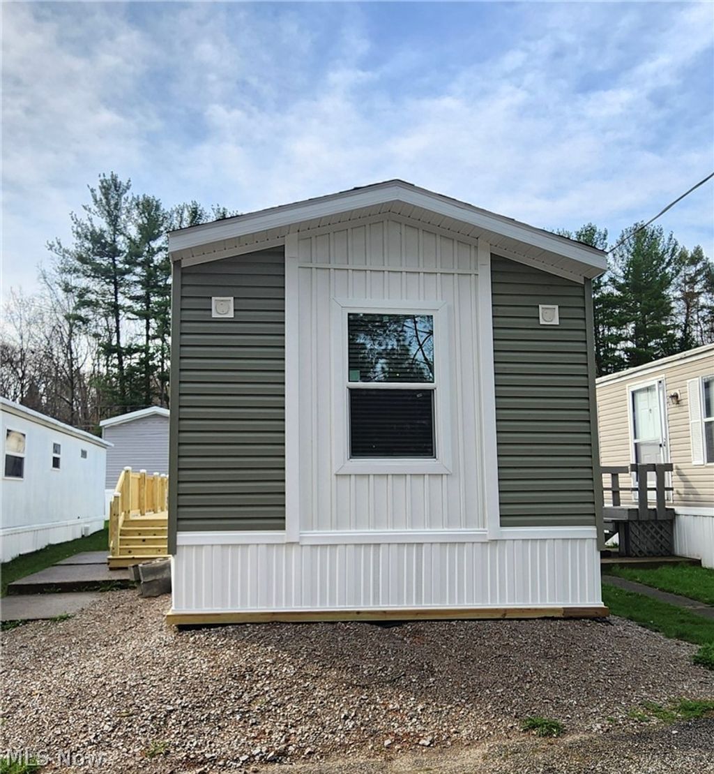 Photo of 9735 Chillicothe Road #10, Kirtland, OH 44094 (MLS # 5207224)